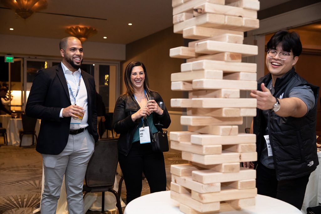 smiling attendees playing a game together