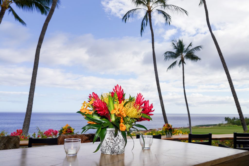 flower decor on table by the ocean