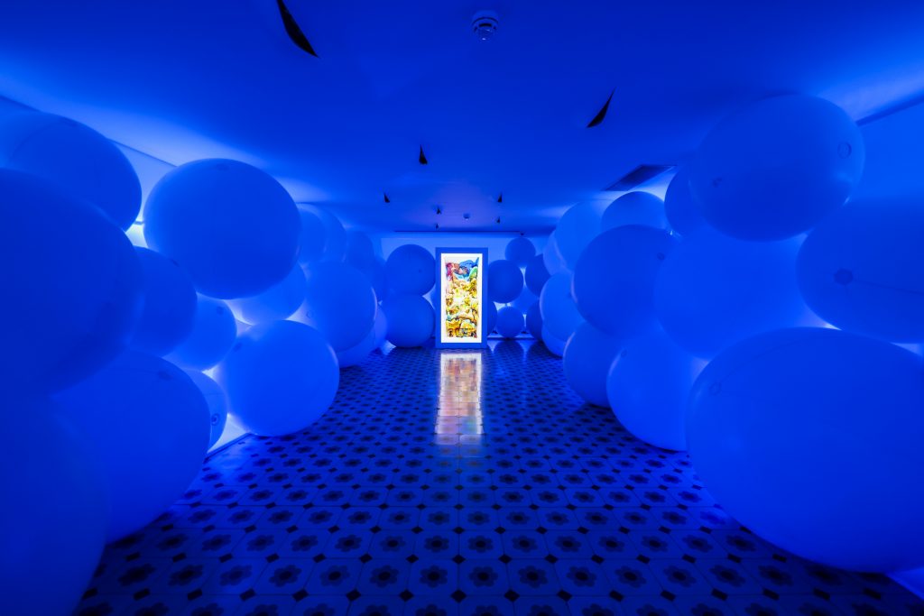 blue room filled with large balloons