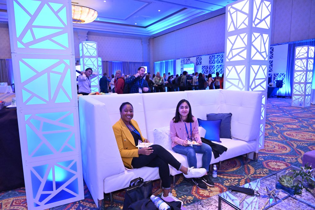 attendees in registration lounge