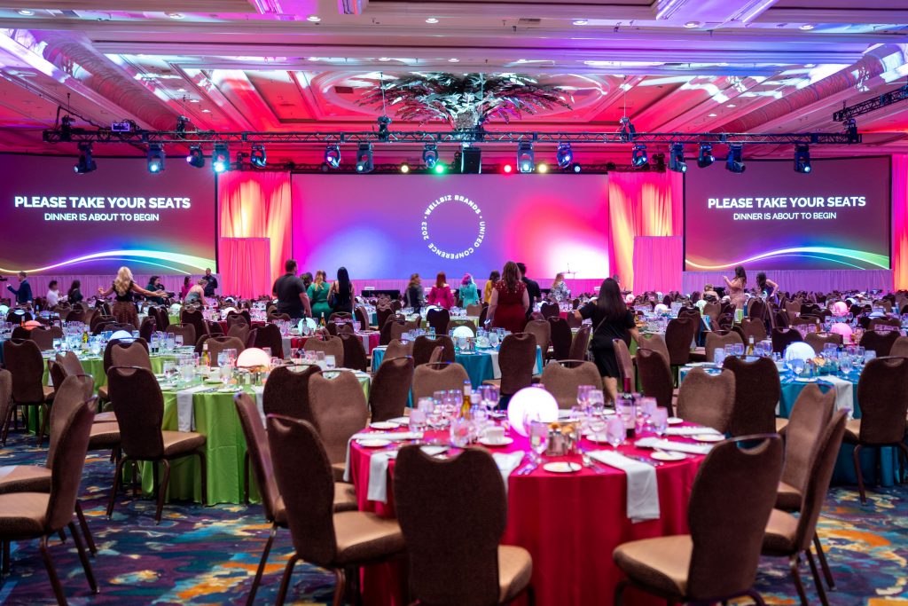 view of franchise conference's stage and tables