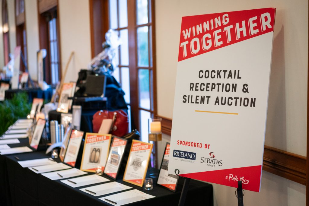 signage for cocktail reception and silent auction