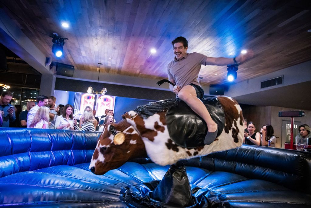 attendee on mechanical bull