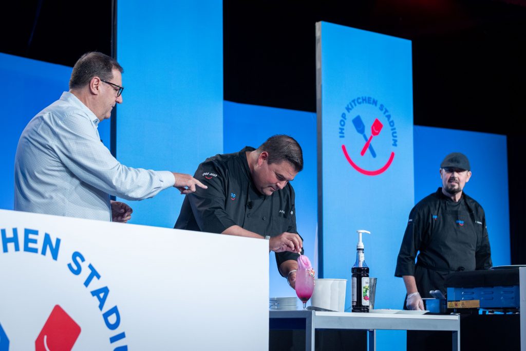 chef on stage at franchise event