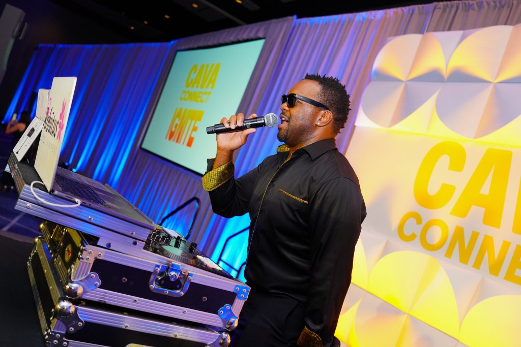 DJ with mic on stage