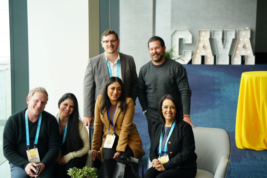 group of attendees smiling 
