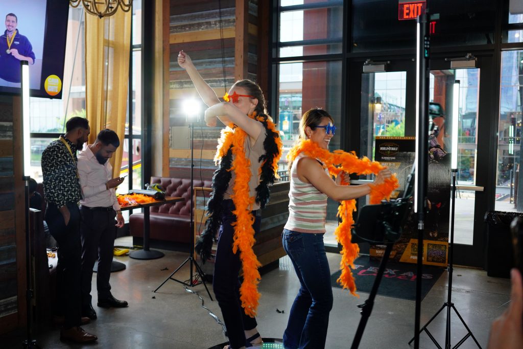 attendees in 360 photo booth