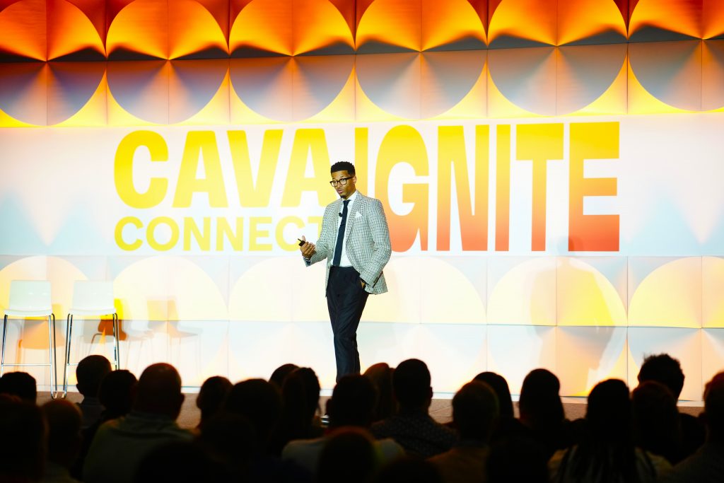 CAVA corporate event speaker on stage