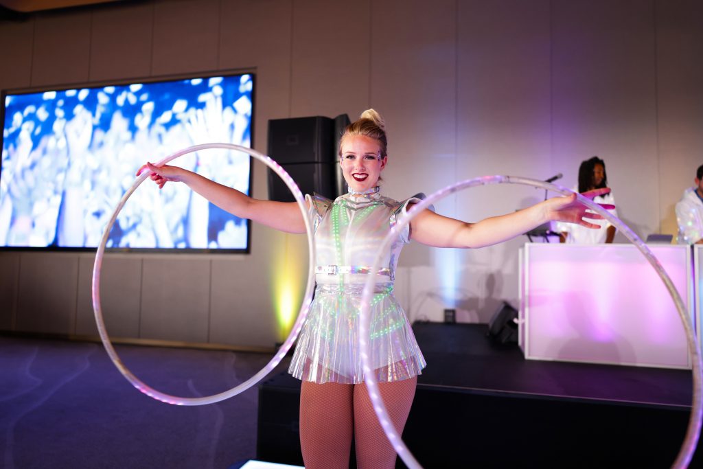 performing with glowing hoops