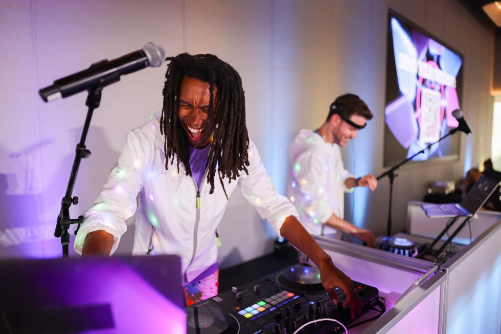 dueling DJs at pharma event