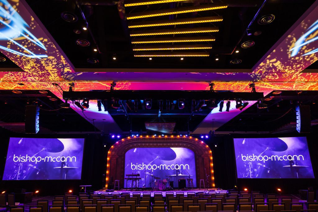 event stage with Bishop-McCann logo