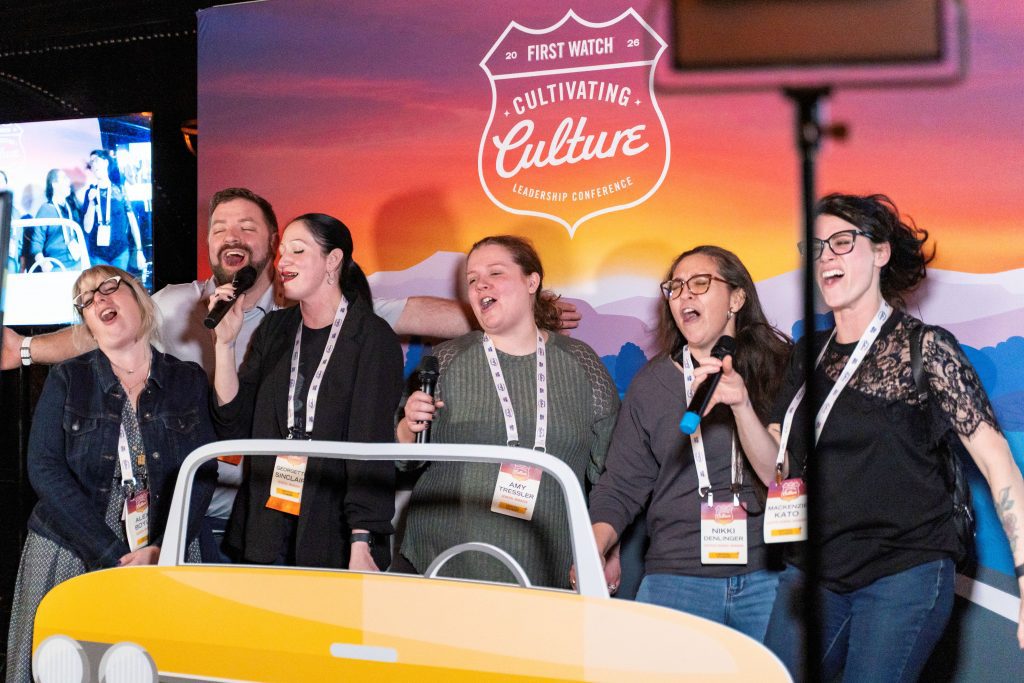 attendees singing at karaoke 