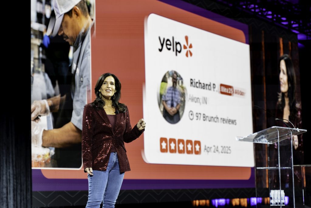 speaker presenting on stage