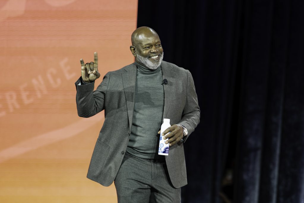 Emmitt Smith smiling on stage