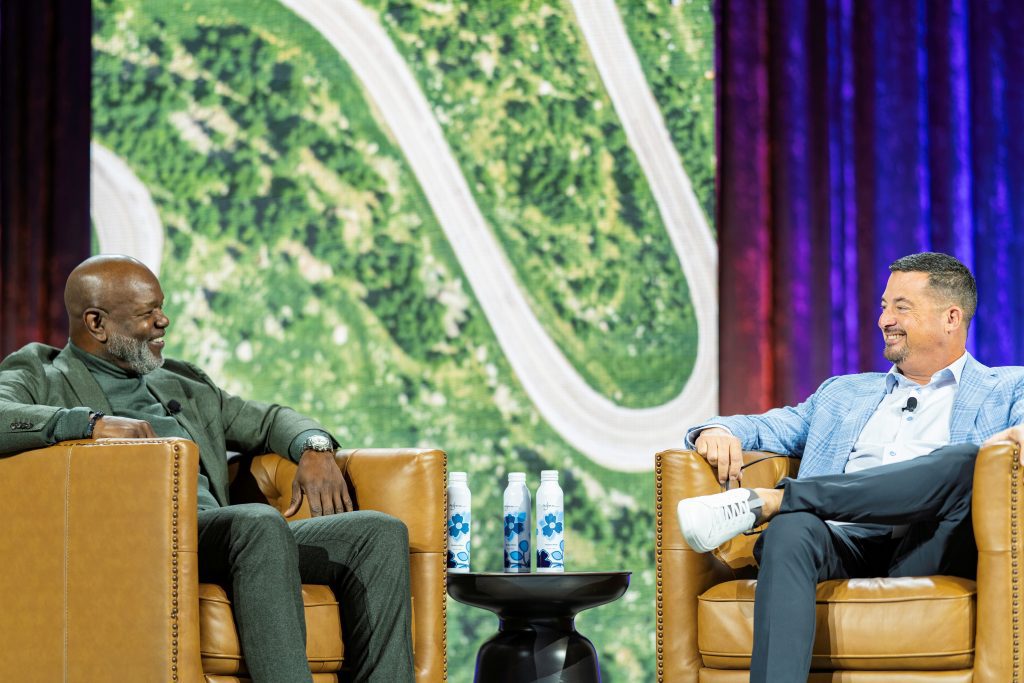 two speakers on stage at First Watch Leadership Conference