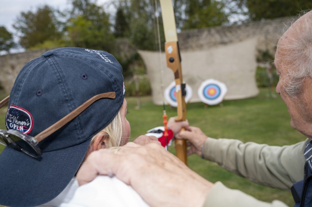attendee doing archery 