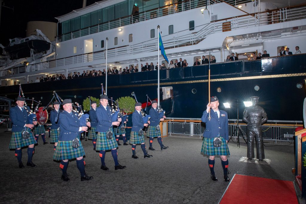 performers playing pipes and drums during incentive trip